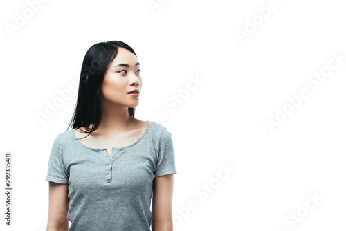 asian girl looking away isolated on white © LIGHTFIELD STUDIOS