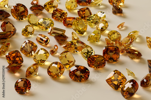 Colorful yellow, orange, brown gemstones on white background photo