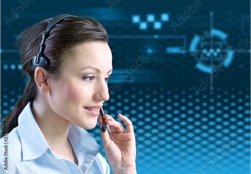 Young businesswoman in headset working in office