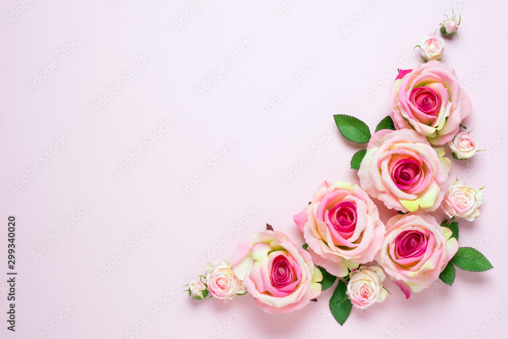 Beautiful wedding background with pink rose flowers on light pink background