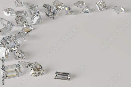 Multiple diamonds scattered along the corner on white background