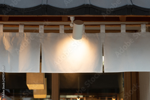 The curtain-like fabric that hangs in front of traditional Japanese restaurants and shops not only serves as a signboard, but holds a larger meaning, photo