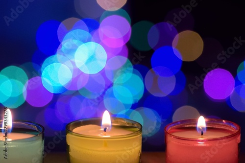 Colorful candles with blurrred background lights during Indian festival Diwali