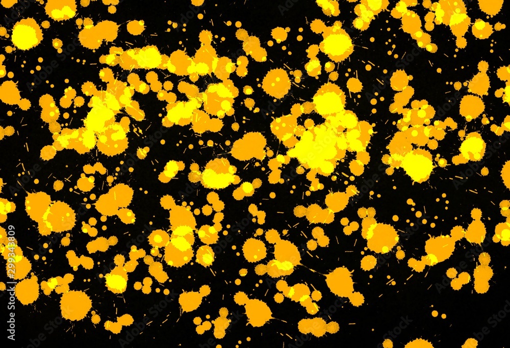 Yellow and orange splash on black background Yellow and orange splash on black background