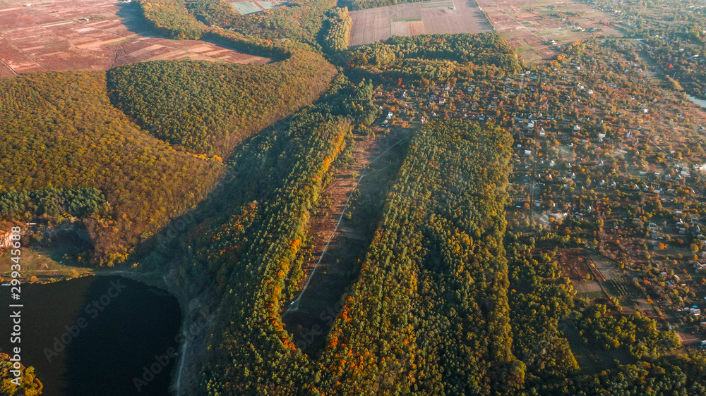 Autumn landscape. Aerial view. Autumn forest on the hill Autumn landscape. Aerial view. Autumn forest on the hill