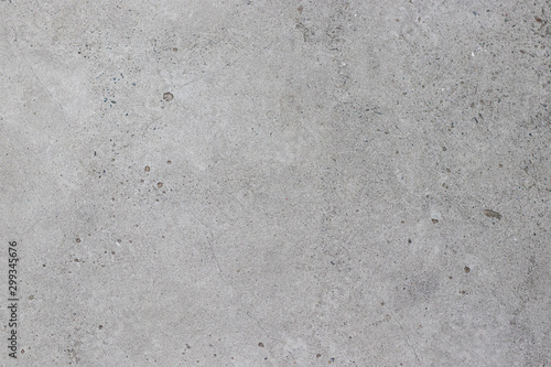 Concrete gray texture with small dots and cracks