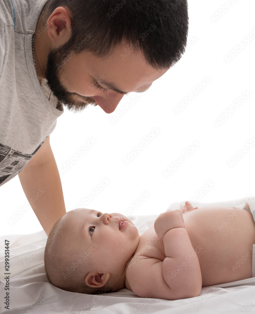 Bearded young dad with newborn in studio Bearded young dad with newborn in studio