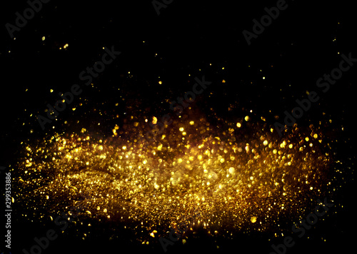 Fototapete golden glitter bokeh lighting texture Blurred abstract background for birthday,