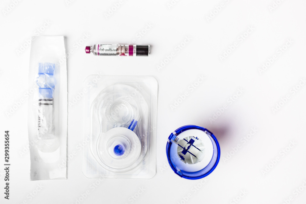 Insulin ampoule and continuous glucose monitor CGMequipment isolated Stock Photo Adobe Stock