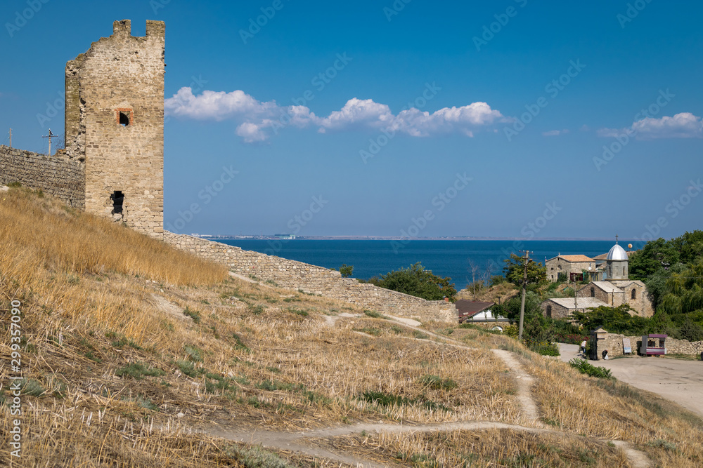 Tower of Crisco (Genoese fortress) and the church of the Iveron icon of the Mother of God in Crimea, Feodosia