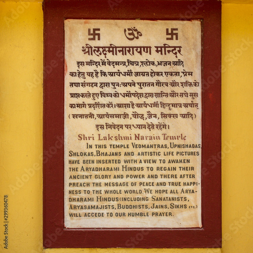 Bilingual explanation Sign of Shri Laxminarayan Temple, Birla Mandir, Hindu Vishnu Temple in New Delhi, India, Asia.