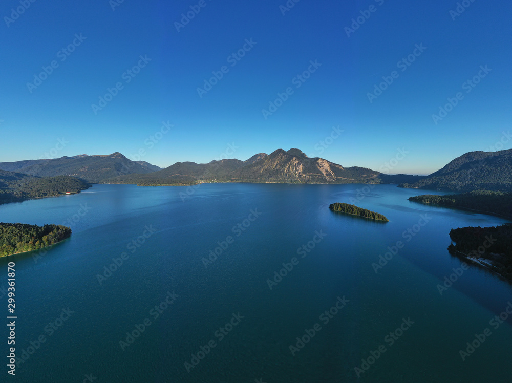 Beautiful panorama of lake Walchensee, Bavaria Germany. Flying on drone. Island of Sassau