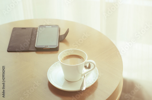 Coffee cup on wood table