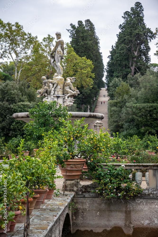 FLORENCE, TUSCANY/ITALY - OCTOBER 20 : Small pond with statues in Boboli gardens Florence on October 20, 2019 FLORENCE, TUSCANY/ITALY - OCTOBER 20 : Small pond with statues in Boboli gardens Florence on October 20, 2019