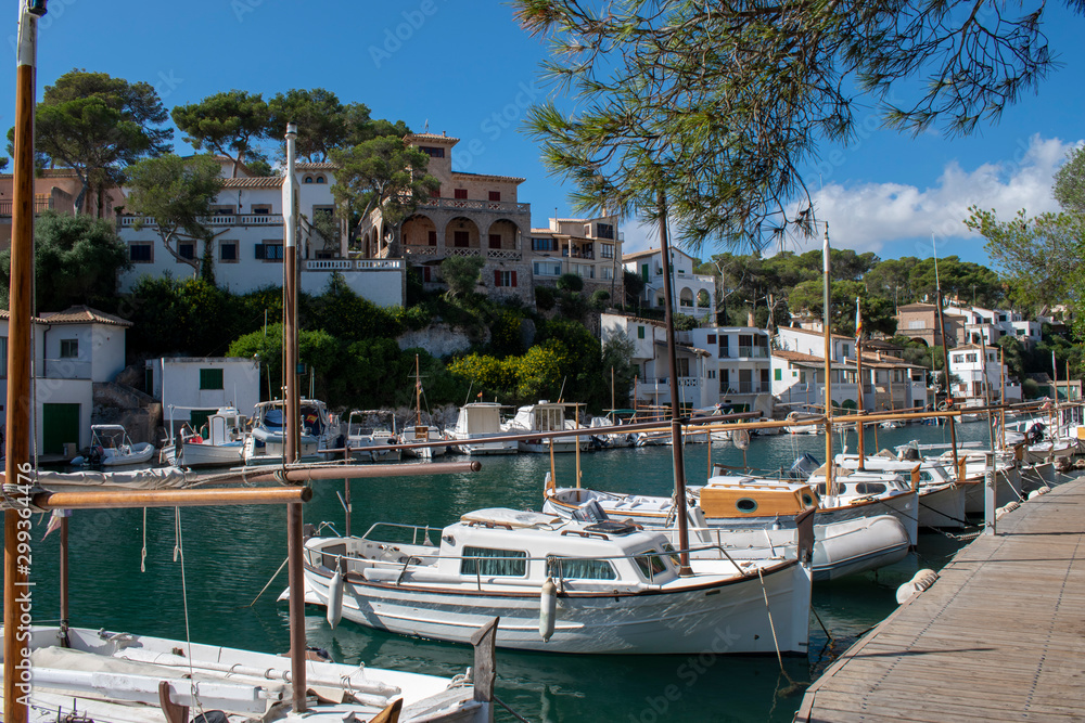 Cala Figuera Majorca, view of this natural port and traditional village which retains an atmosphere of a working fishing port.  View of sailboats moored in this beautiful location.