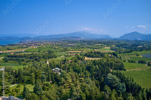 Fototapeta Naklejka Na Ścianę i Meble -  Panoramic view of the meadows and mountains of Lake Garda
