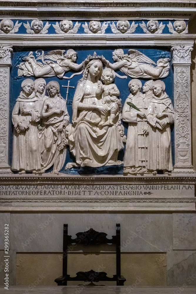 FLORENCE, TUSCANY/ITALY - OCTOBER 19 :Madonna Enthroned, work by Luca della Robbia, Medici Chapel Santa Croce Church in Florence on October 19, 2019