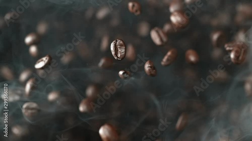 Super slow motion of flying coffee beans in speed ramping. Filmed on high speed cinema camera, 1000 fps. photo