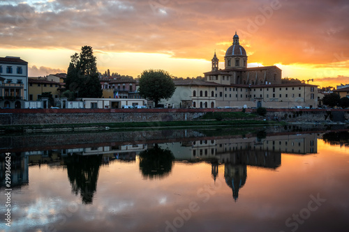 FLORENCE, TUSCANY/ITALY - OCTOBER 19 : View of buildings along the River Arno at dusk in Florence on October 19, 2019