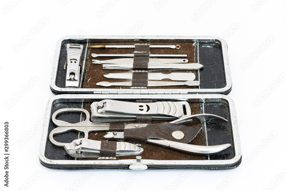 Studio shot grooming kit and nail tools in travel case isolated on white Studio shot grooming kit and nail tools in travel case isolated on white