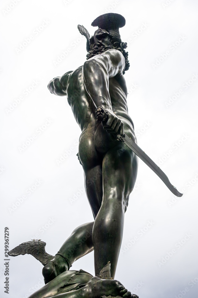 FLORENCE, TUSCANY/ITALY - OCTOBER 19 : Statue of Perseus holding the head of Medusa in Florence on October 19, 2019 FLORENCE, TUSCANY/ITALY - OCTOBER 19 : Statue of Perseus holding the head of Medusa in Florence on October 19, 2019