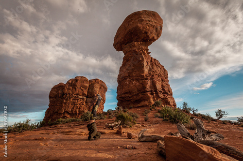 Head-stand in front of the Balanced Rock 