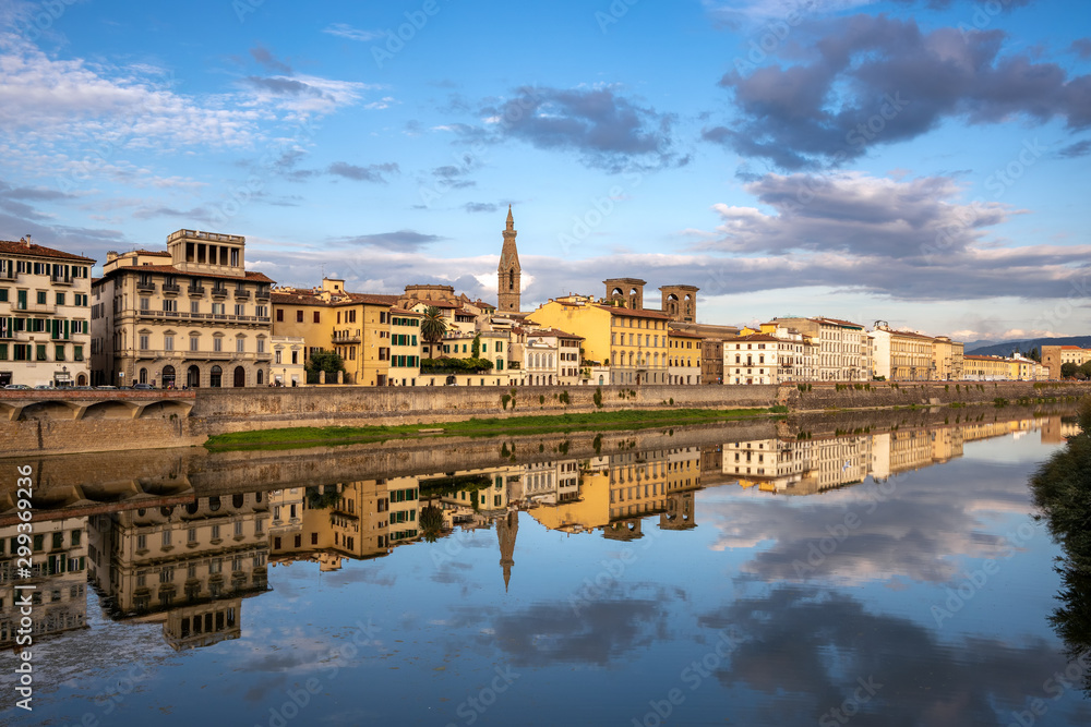 FLORENCE, TUSCANY/ITALY - OCTOBER 18 : View of buildings along and across the River Arno in Florence  on October 18, 2019. Unidentified people.