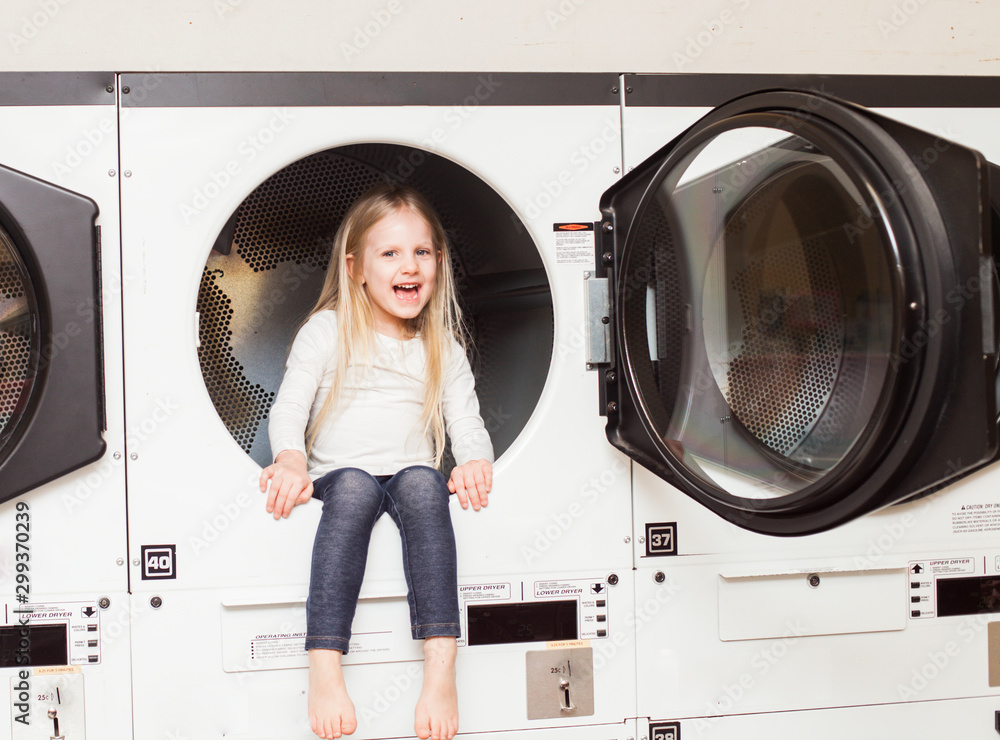 Girl Sitting On Washing Machine