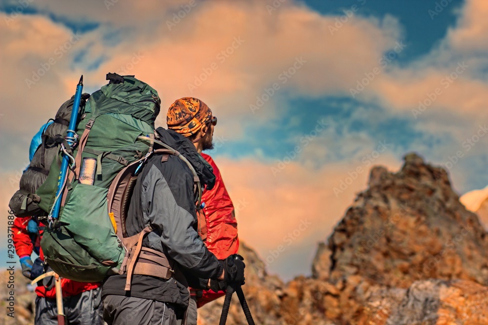 Man Traveler with big backpack mountaineering Travel Lifestyle concept lake  and mountains on background, extreme vacations outdoor Stock Photo | Adobe  Stock