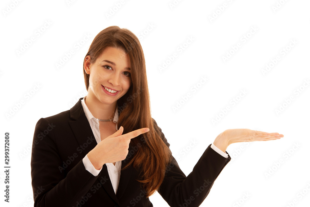 Beautiful business woman point in copy space isolated over white Beautiful business woman point in copy space isolated over white