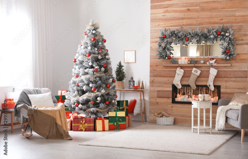 Beautiful interior of living room with decorated Christmas tree - obrazy, fototapety, plakaty 