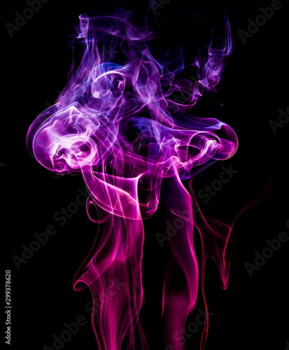 Colored smoke on black background