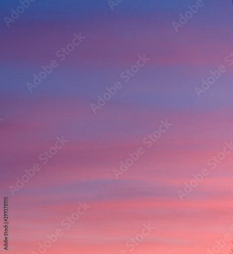 Abstract colorful background. Sunset sky, with gradient transitions from pale pink to purple