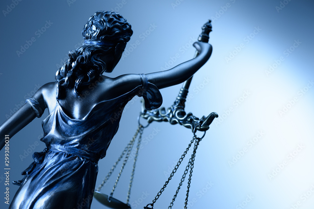 Statue of justice on blue background - obrazy, fototapety, plakaty 