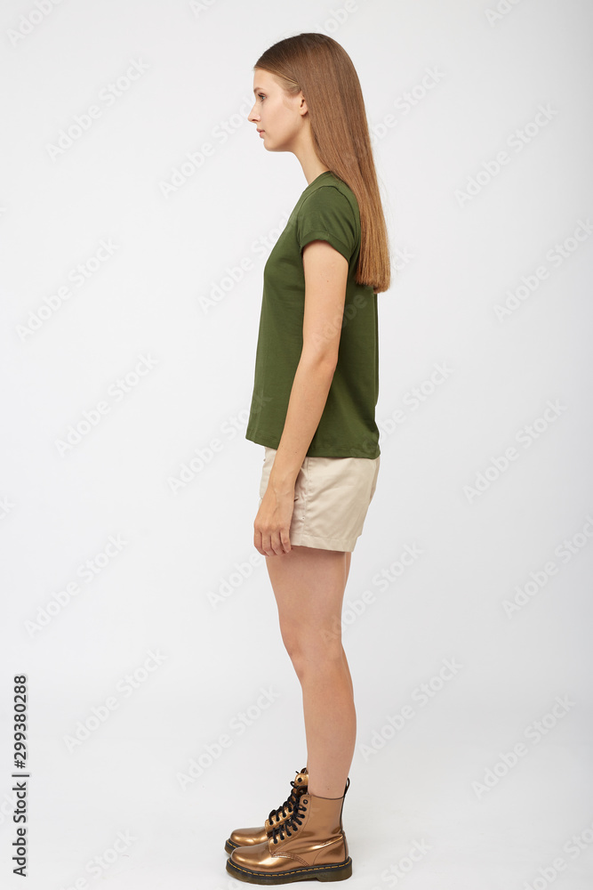Teenager girl in beige cargo shorts Teenager girl in beige cargo shorts