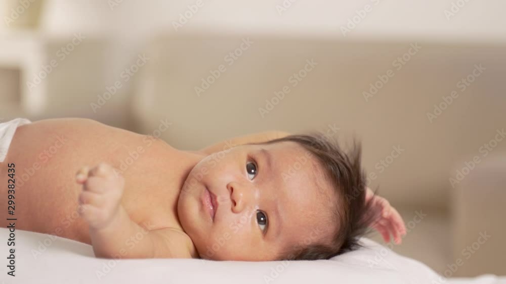newborn infant baby being checked with stethoscope close up newborn infant baby being checked with stethoscope close up
