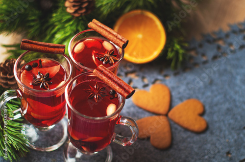 Christmas mulled red wine with spices, oranges and cinnamon. Hot, delicious drink.	