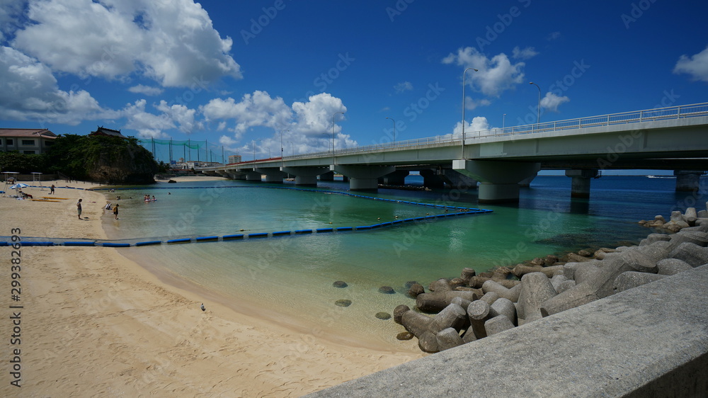 Dedicated area for beach relaxation and swimming in a sea under the bridge in Haha, Okinawa, Japan. Dedicated area for beach relaxation and swimming in a sea under the bridge in Haha, Okinawa, Japan.