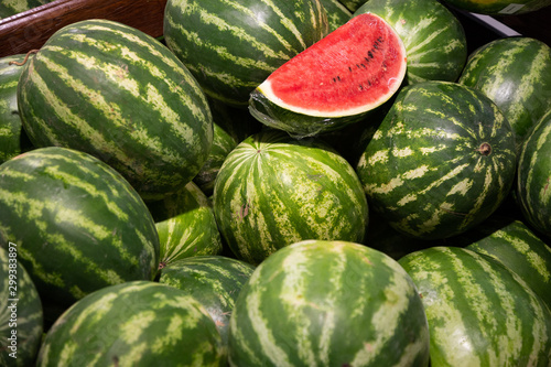 Close-up of mellow water-melons in box in supermarket