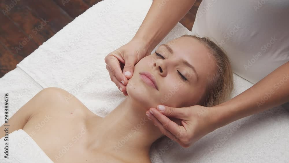 Young, beautiful and healthy woman in spa salon. Traditional Thai massage therapy and skin care. Young, beautiful and healthy woman in spa salon. Traditional Thai massage therapy and skin care.