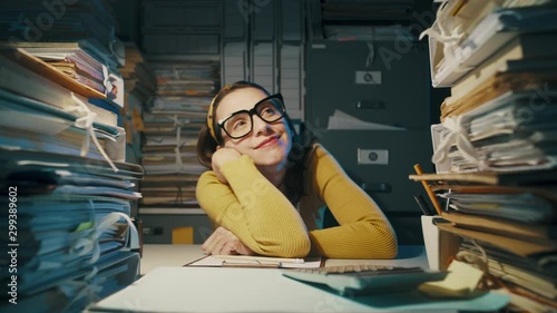 Lazy woman daydreaming in the office