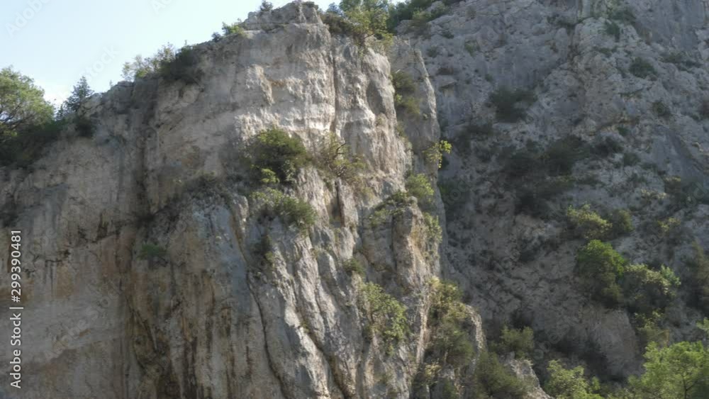Huge cliffs at the border of a lake in the croatian national park krka. Huge cliffs at the border of a lake in the croatian national park krka.