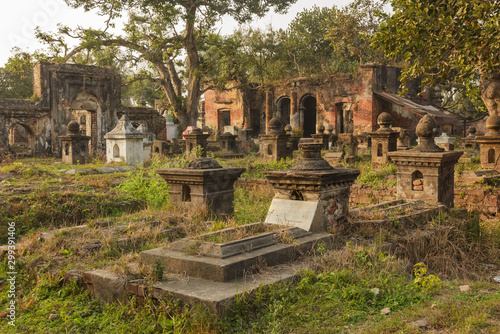 Murshidabad, West Bengal/India - January 17 2018: An ancient Islamic graveyard with old, ruined crypts and tombs in the outskirts of Murshidabad.