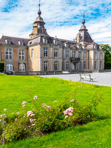 Modave Castle or Castle of the Counts of Marchin against beautiful cloudy sky