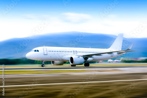 Commercial modern white airplane with nice sky,Happy journey and holidays concept. Aviation and transportation.