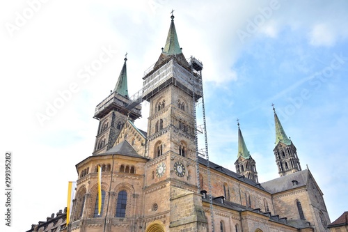 Bamberg, Germany - May 2019. Historical building in th old town of Bamberg (Bavaria, Franconia). View on famous tourist attraction in the center of Bamberg. Tourists visiting the sights of the town 