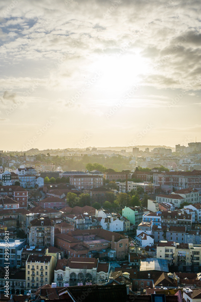 An amazing panoramic view of the city of Lisbon from the Miradouro da Senhora do Monte during sunset time.