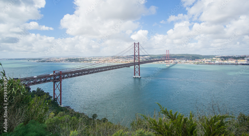 Stunning pictures of the Ponte 25 de Abril bridge - Over 2km-long, this striking Golden Gate-style bridge links Lisbon with Almada in Portugal. 