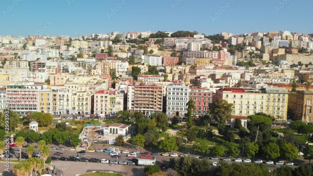 Naples Riviera Italy, Cinematic Pull Back Aerial of Affluent Chiaia Waterfront Disctrict on Sunny Day Naples Riviera Italy, Cinematic Pull Back Aerial of Affluent Chiaia Waterfront Disctrict on Sunny Day