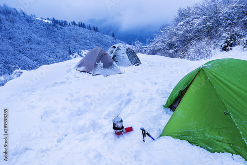 Winter camping. Tents on the snow